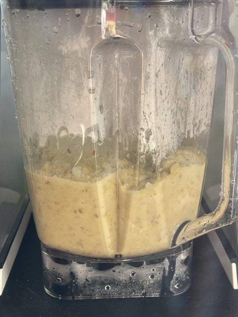 IMG_4190 a blender with a yellow liquid in it